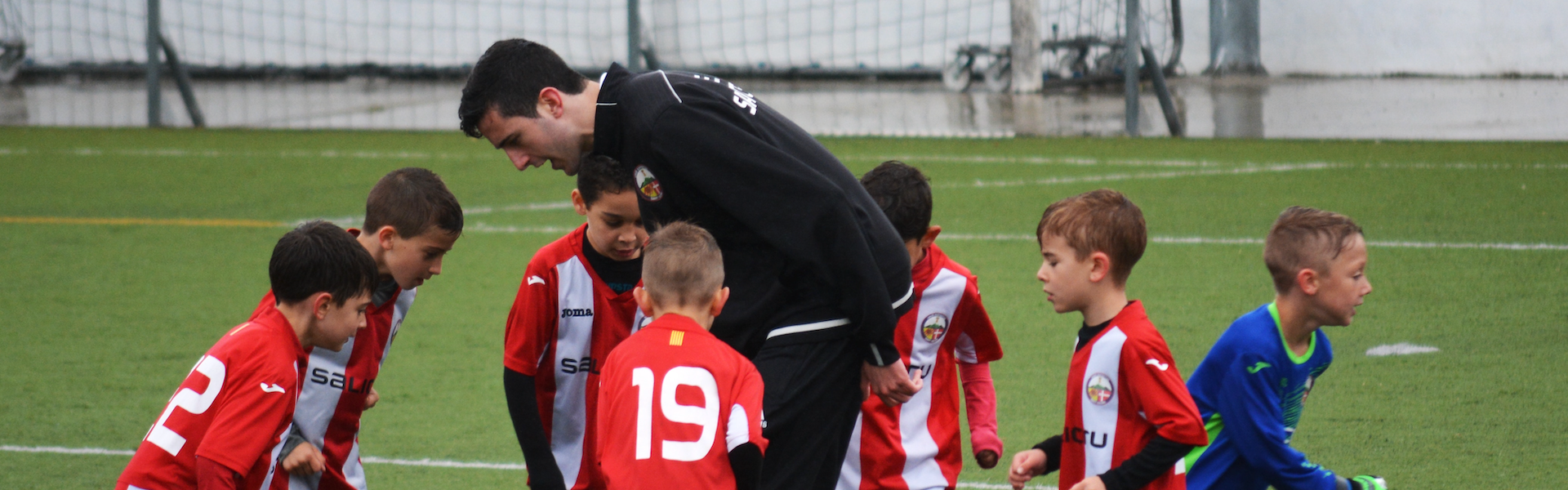 Kids being coached football