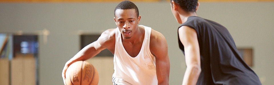 Young man playing basketball