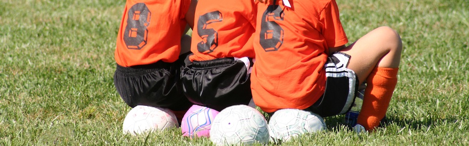 Kids watching football