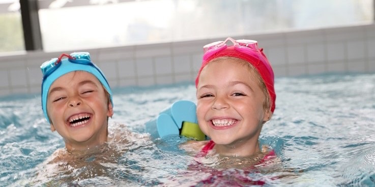 Kids swimming in pool